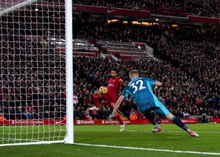 Liverpool’s Mohamed Salah scores their side’s third goal of the game during the Premier League match at Anfield, Liverpool. Picture date: Saturday November 20, 2021