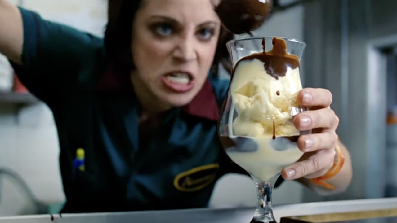 Naomi (Alanna Ubach) makes dessert in Waiting...