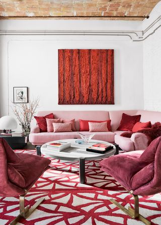 a pink and red living room