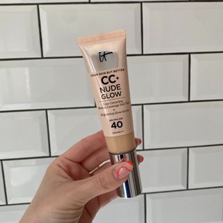 Original image showing hand holding the IT Cosmetics Nude Glow CC Cream