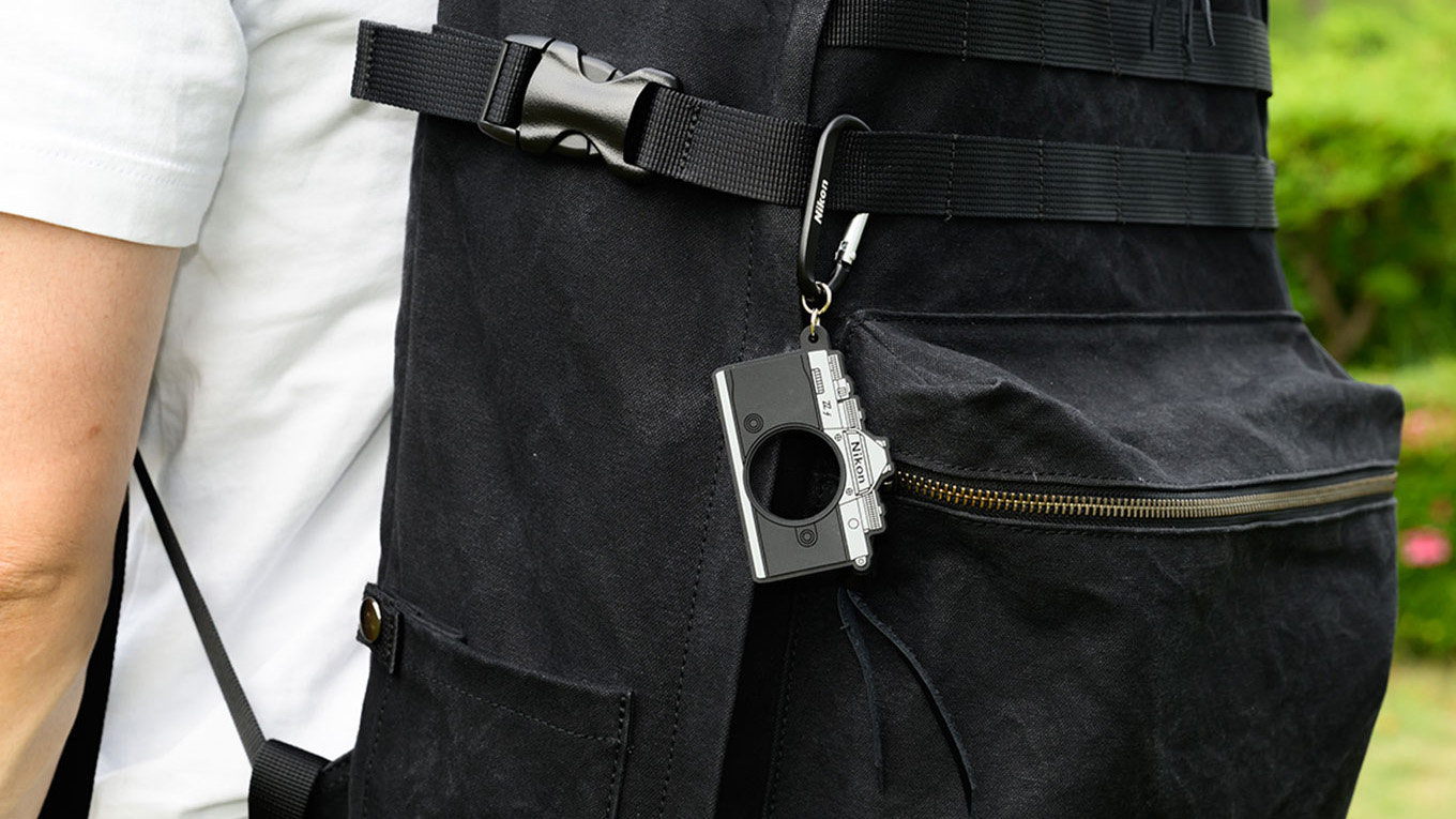 Nikon Zf bottle holder attached to backpack