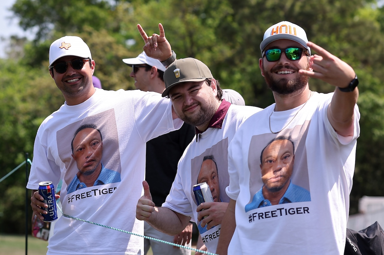 HOUSTON, TEXAS - MARCH 28: Fans pose for photos while wearing shirts in support of Tiger Woods during the third round of the Texas Children's Houston Open 2026 at Memorial Park Golf Course on March 28, 2026 in Houston, Texas. (Photo by Mike Mulholland/Getty Images)