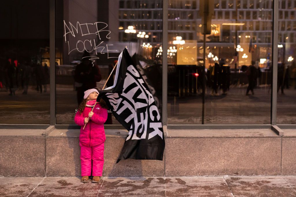 Protester demanding justice for Amir Locke