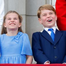 Princess Charlotte of Cambridge and Prince George of Cambridge watch a flypast from the balcony of Buckingham Palace during Trooping the Colour on June 2, 2022 in London, England.