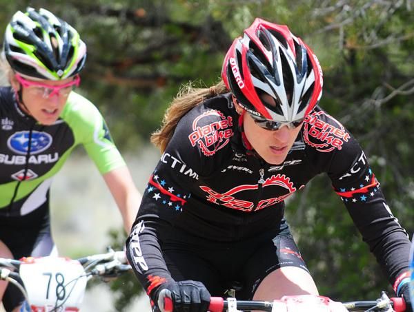 Katie Compton (Planet Bike) in perfect position behind Gould.