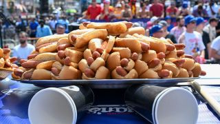 Hot dogs are placed on the competition table ahead of the 2023 Nathan's Famous Fourth of July International Hot Dog Eating Contest at Coney Island on July 04, 2023 in the Brooklyn borough of New York City ahead of the 2024 edition of the event.