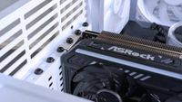 Installing an ASRock Challenger Radeon RX 9070 XT GPU inside an iBUYPOWER RDY Trace X R01 pre-built gaming PC with a white case