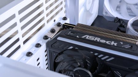 Installing an ASRock Challenger Radeon RX 9070 XT GPU inside an iBUYPOWER RDY Trace X R01 pre-built gaming PC with a white case