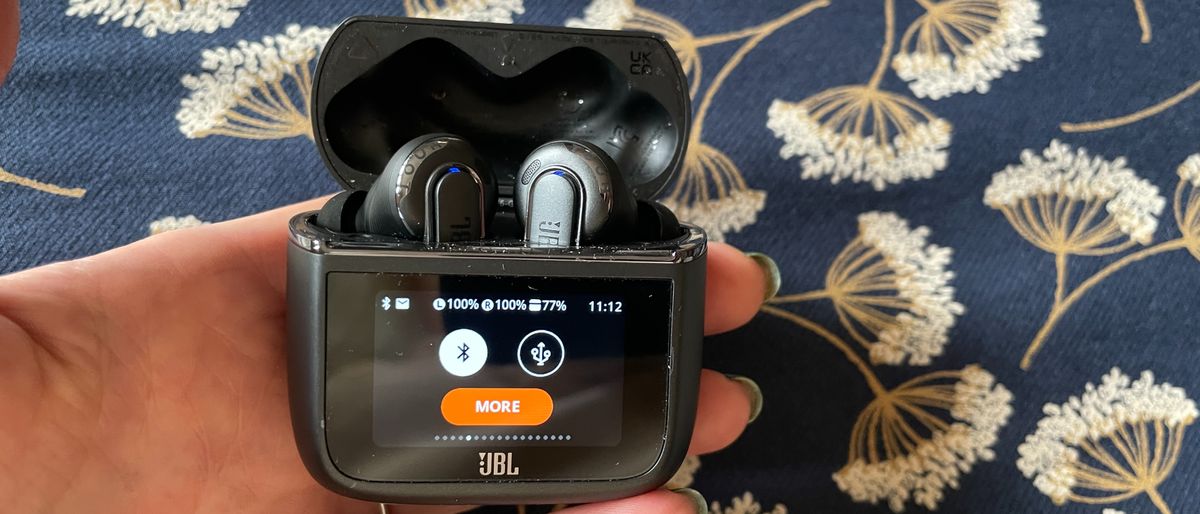 JBL Tour Pro 3 held in a hand 