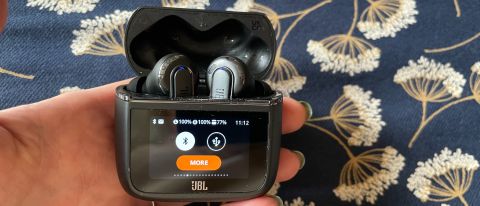 JBL Tour Pro 3 held in a hand 