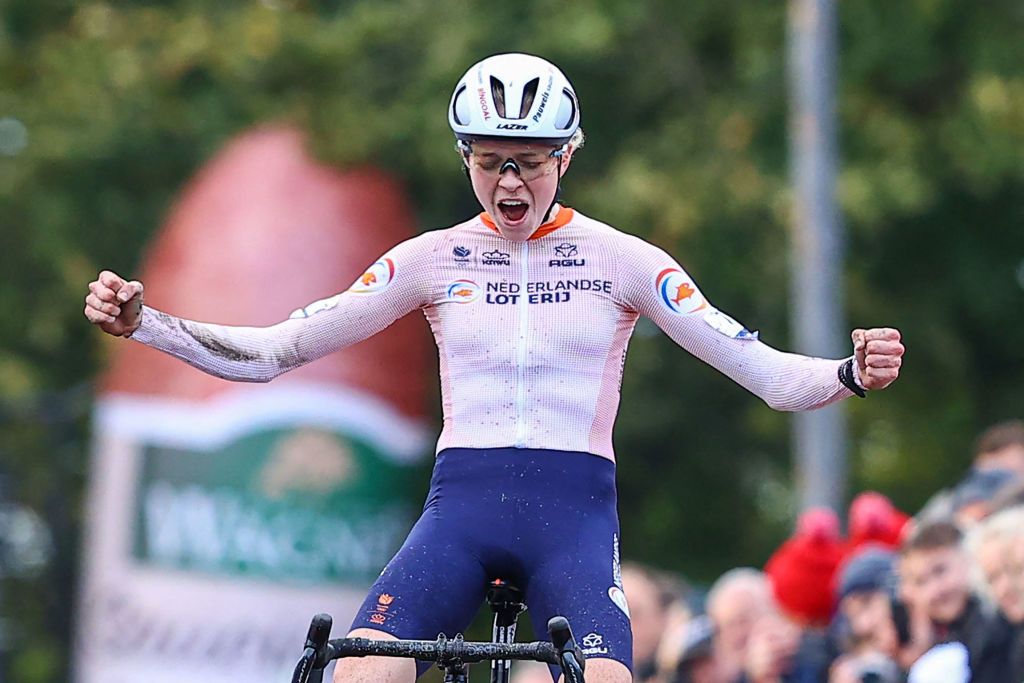 Netherlands cyclist Fem Van Empel celebrates crossing the finish line to win the womens elite race at the European Championships cyclocross cycling in Namur on November 5 2022 Dutch rider Fem van Empel became European cyclocross champion ahead of her compatriot Ceylin Alvarado and Hungarys Blanka Vas in Namur Belgium OUT Photo by DAVID PINTENS BELGA AFP Belgium OUT Photo by DAVID PINTENSBELGAAFP via Getty Images