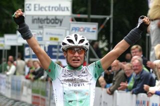 Marianne Vos (Nederland Bloeit) celebrates her victory in stage three.