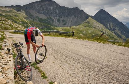 Fixing a puncture on a ride in the mountains