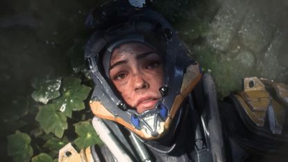 Screenshot of Anthem machine pilot lying on the leafy ground with visor open