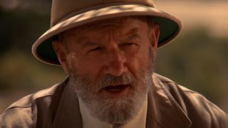 Gene Hackman with a white beard and a hat in Geronimo: An American Legend