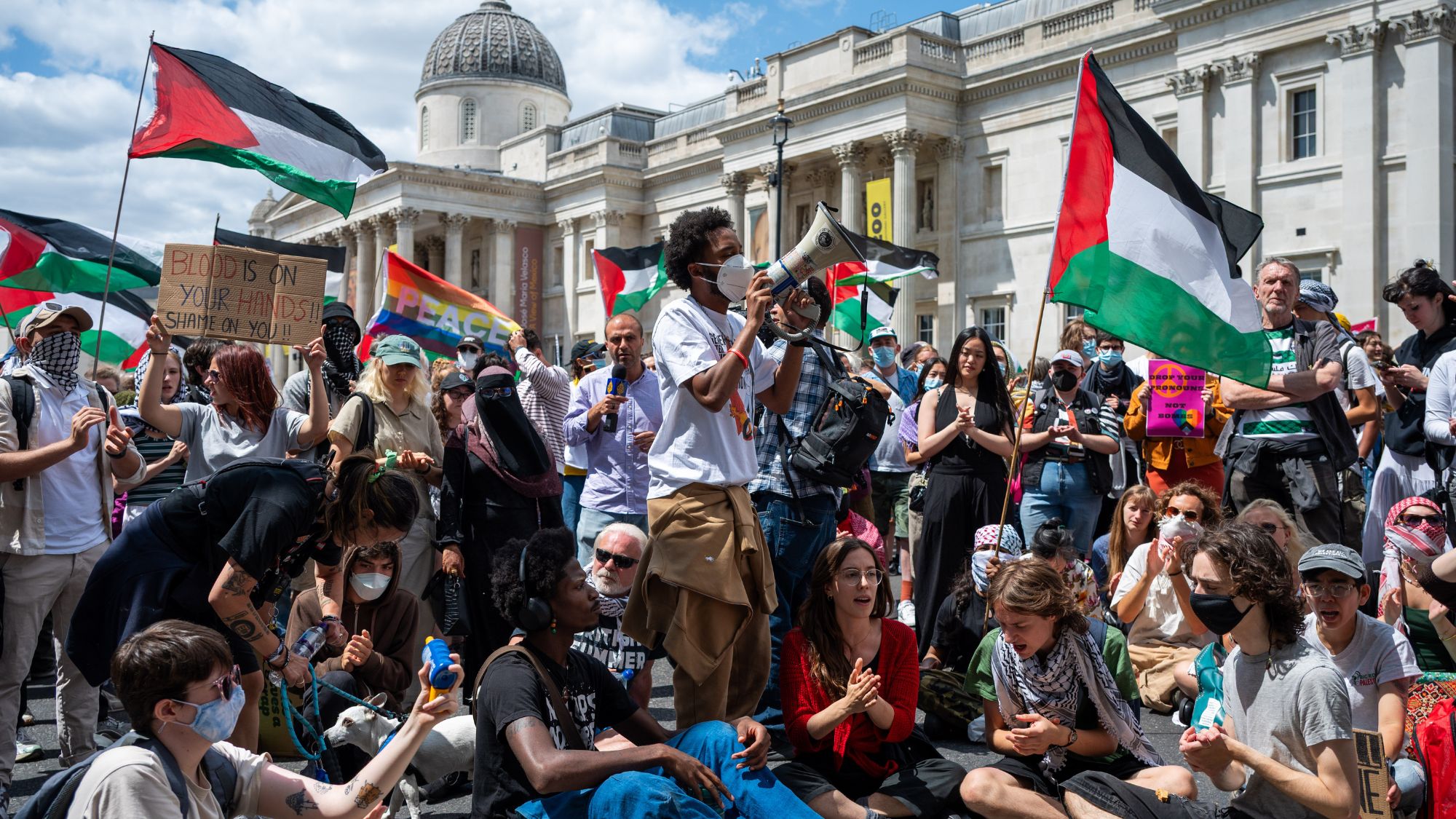 Pro-Palestinians chant to the crowds in Trafalgar Square on June 23, 2025 in London, England. Members of the Palestine Action (PA) campaign group called an emergency demonstration as Home Secretary Yvette Cooper proscribed the group, making it unlawful to join the organisation.