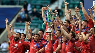 Antoine Dupont, captain of Toulouse celebrates with team mates after their victory during the Heineken Champions Cup Final match between La Rochelle and Toulouse at Twickenham Stadium on May 22, 2021