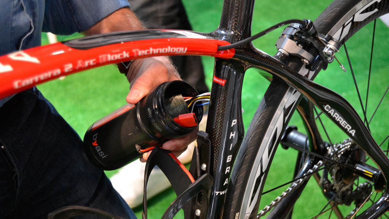 The only giveaway is the wires going from the bottle-mounted battery into the frame. The range is between 45mins and 4hrs depending on the mode and terrain. Retro-fitting is done by Italia carbon specialists Sarto. The cut open the frame, install the motor, then repair the frame to be as good as new. It costs &euro;3,000 all in, so at least that's one thing stopping them from ruining every sportive and Strava segment in the country before the end of summer