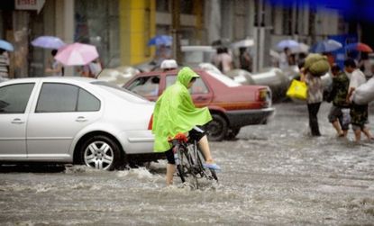 Floods like this downpour in China and other severe weather events may be caused by climate change, and can drive people nuts with anxiety and depression, according to a new report.
