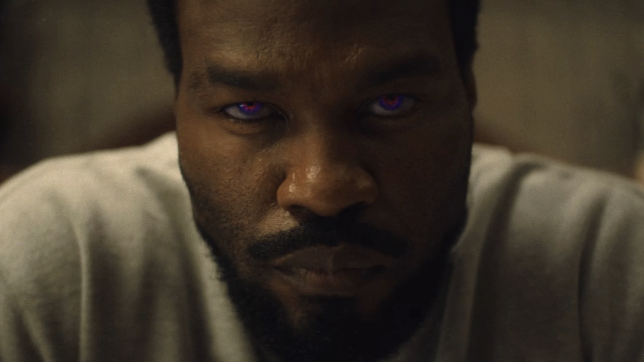 Close-up on Simon with purple eyes in Wonder Man Season 1