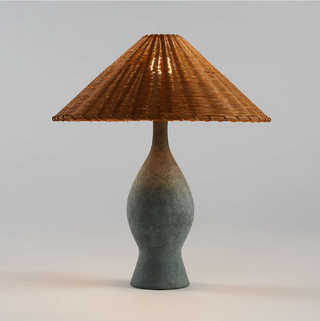 Lamp with rattan shade.