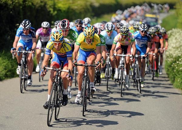 Race leader Nicolas Baldo (Atlas Jakroo) is brought to the front of the peloton during the final lap of the Skerries Circuit
