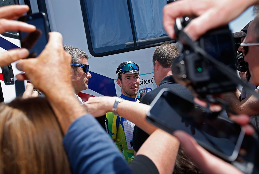 Mark Cavendish draws a crowd before another stage start.
