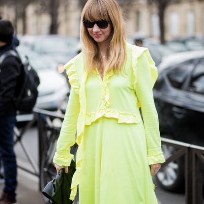 Street fashion, Clothing, Fashion, Yellow, Trench coat, Outerwear, Coat, Snapshot, Eyewear, Sunglasses, 