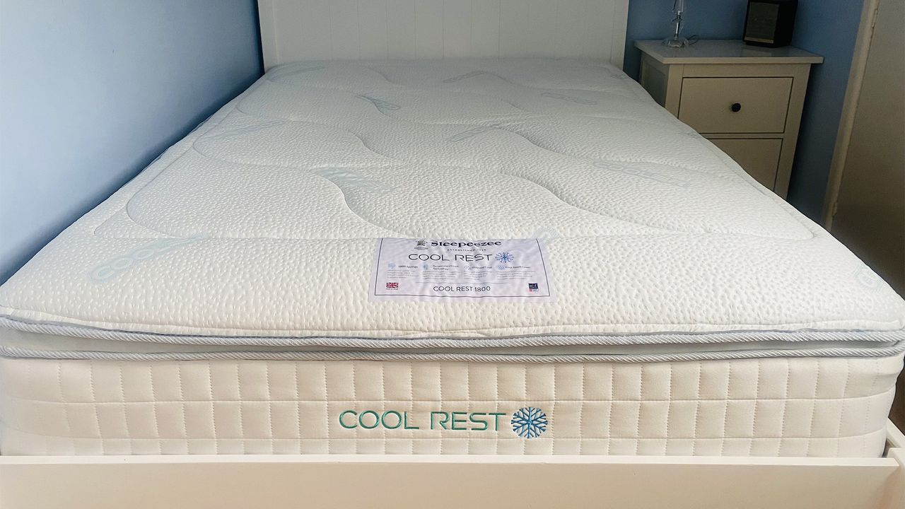 The Sleepeezee Cool Rest 1800 mattress resting on a bed frame in our reviewer's bedroom