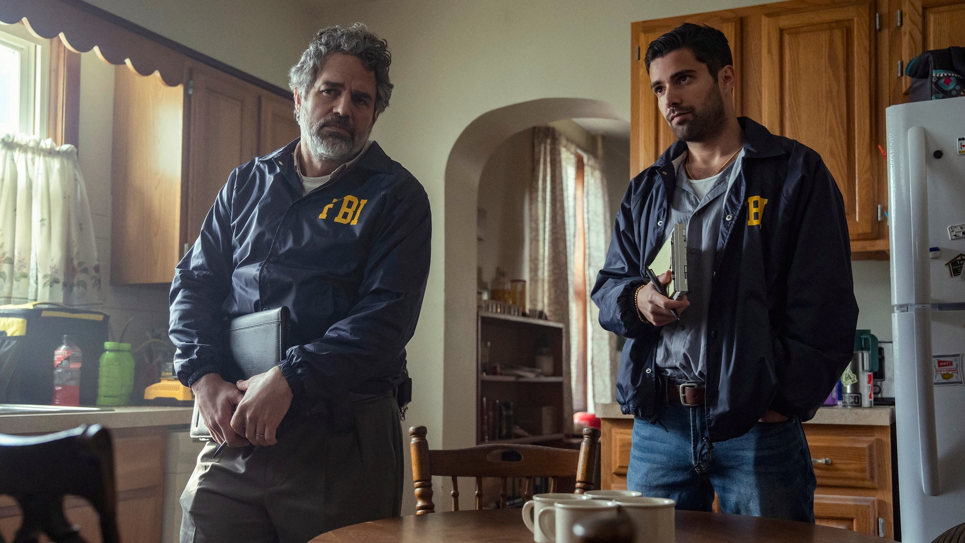 L-R: Mark Ruffalo and Fabien Frankel in FBI jackets in a scene from HBO's "Task"