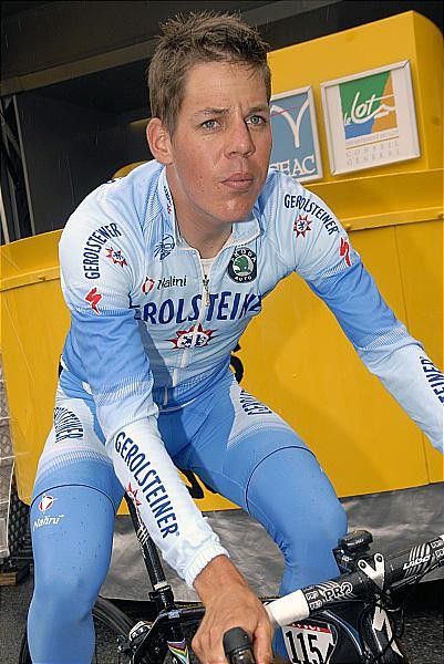 Bernhard Kohl is thinking about the day ahead in the rain.