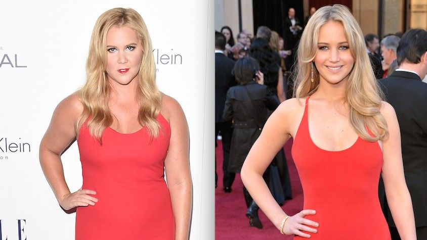 Amy Schumer and Jennifer Lawrence in similar red dresses.