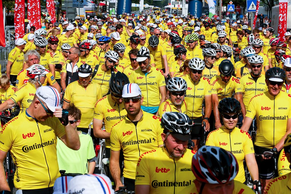 Riders take part in the 'BK Yellow Ride' world record attempt for 'most yellow jerseys riders', on June 30, 2019 in Gent, ahead of the 'Grand Depart' start of the Tour de France cycling race in Brussels.