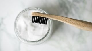 baking soda with a toothbrush