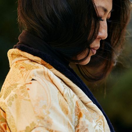 Hair, Yellow, Shoulder, Beauty, Skin, Hairstyle, Neck, Eye, Outerwear, Human, 