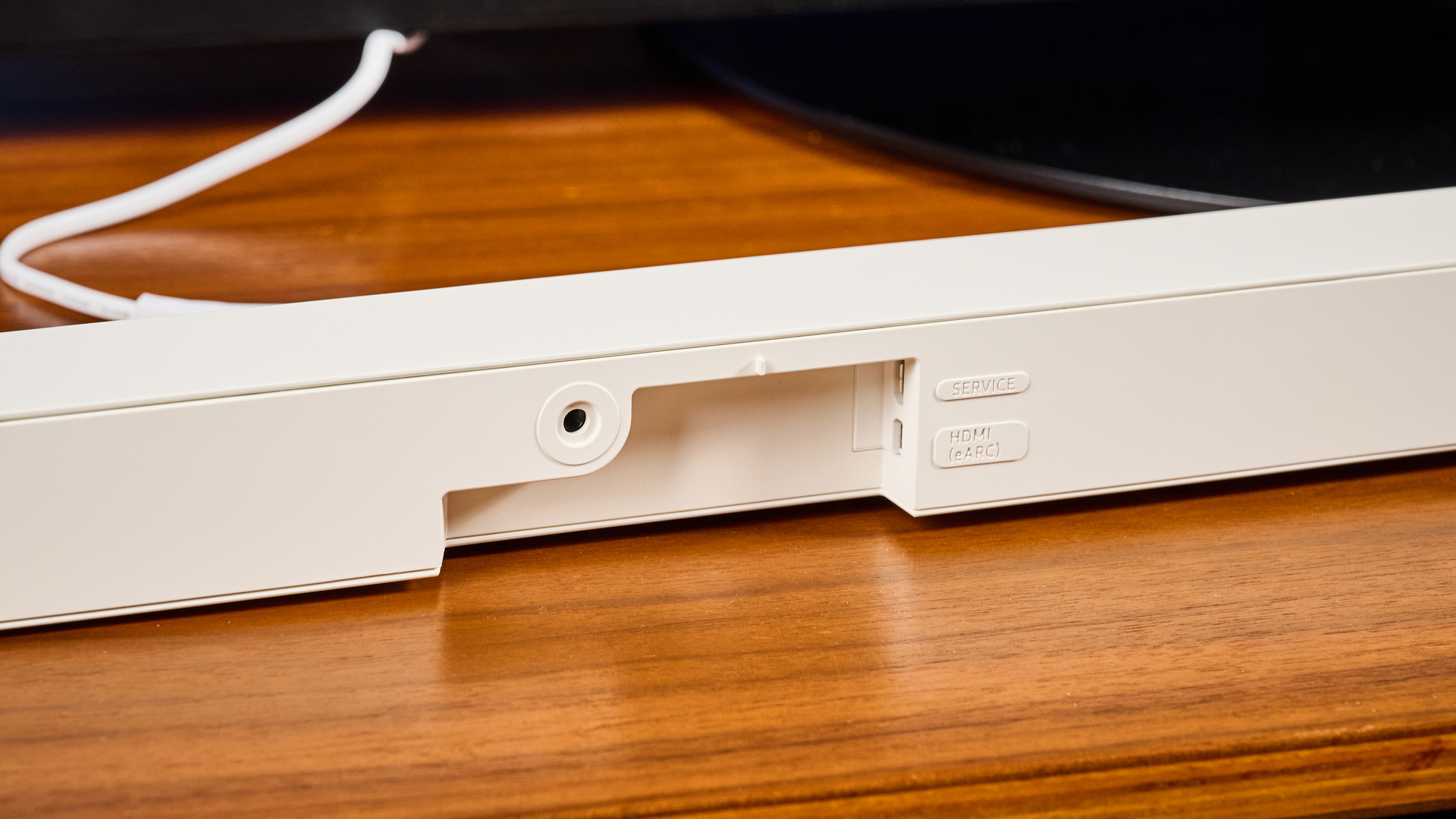 the samsung hw-s801d soundbar and subwoofer in white, an ultra slim soundbar with on-bar buttons, a remote, and separate subwoofer with a black cone