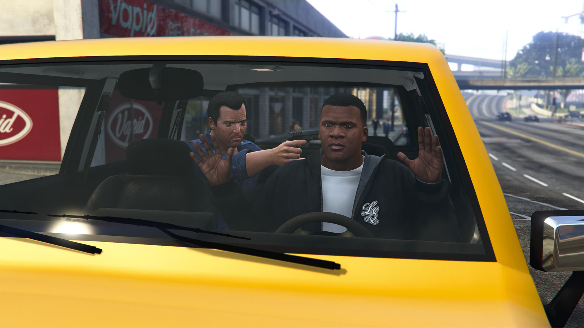 Michael holds up Franklin from the backseat of a car in GTA 5, in the early mission where they meet