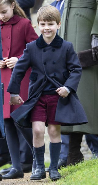 Prince Louis wearing his shorts and coat at Christmas Sandringham church service