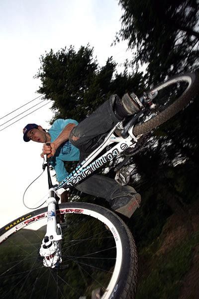 Gee Atherton cuts some tricks.