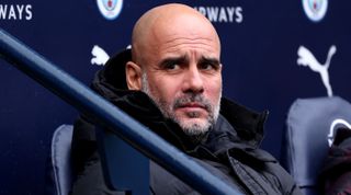 Manchester City manager Pep Guardiola looks on prior to the Premier League match between Manchester City and Everton FC at Etihad Stadium on February 10, 2024 in Manchester, England. (Photo by Alex Livesey/Getty Images)