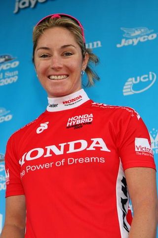 Rochelle Gilmore (HP Pinarello) in the red, leader's jersey of the inaugural Honda Hybrid Tour