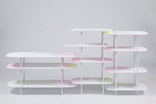 Colourful white shelves with green, pink and yellow shadows by Bijin Davis