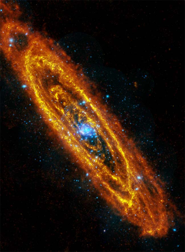 This image of the Andromeda Galaxy is a composite of an infrared photo from ESA&#039;s Herschel space telescope and the XMM-Newton’s X-ray telescope. The infrared frame shows rings of dust that trace gaseous reservoirs where new stars are forming and the X-ray