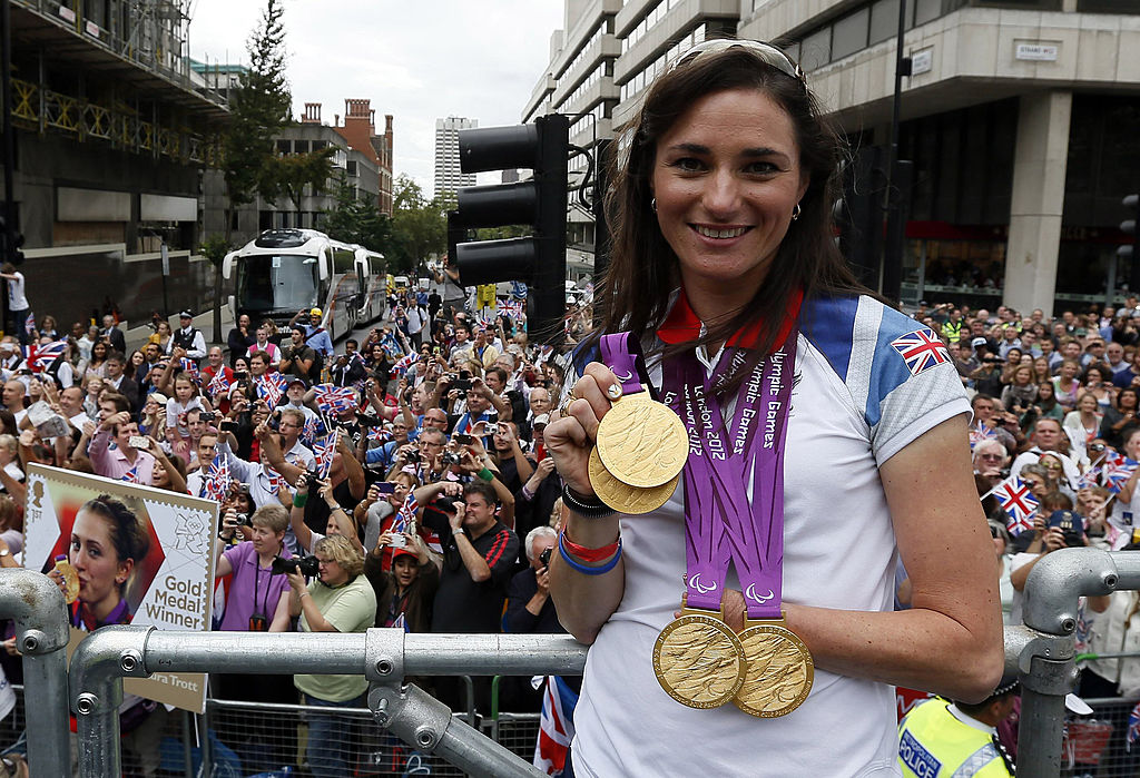 Britains quadruple gold medalwinning cyclist Sarah Storey poses during a parade celebrating Britains athletes who competed in the London 2012 Olympic and Paralympic Games in central London on September 10 2012 Britain was bidding a fond farewell om September 10 to a golden summer of Olympic and Paralympic sport with a victory parade by athletes through London ending up at Buckingham Palace AFP PHOTO POOL STEFAN WERMUTH Photo credit should read STEFAN WERMUTHAFPGettyImages