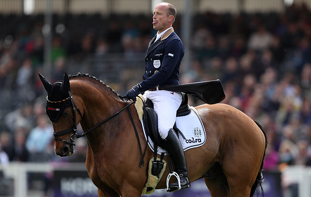 A tongue out at the judges or a face of concentration from the runner up Michael Jung?