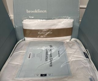 Brooklinen Down Comforter and Duvet Cover in a box.