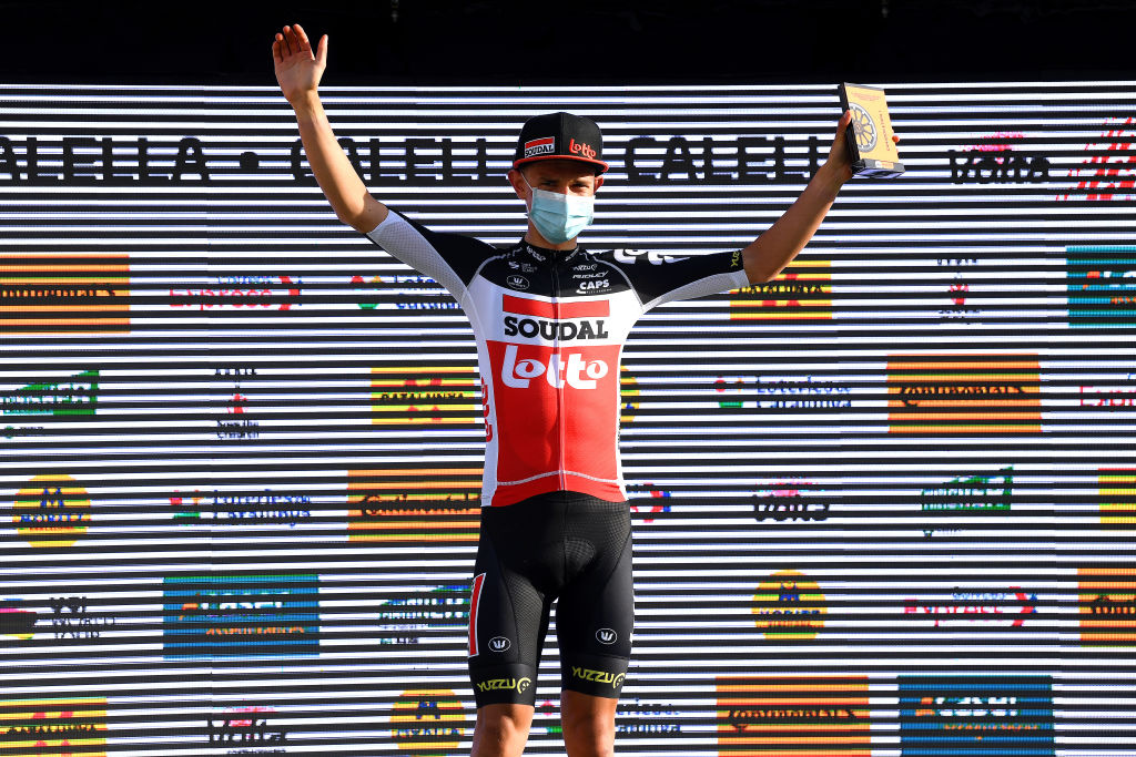 CALELLA SPAIN MARCH 22 Podium Andreas Lorentz Kron of Denmark and Team Lotto Soudal Celebration during the 100th Volta Ciclista a Catalunya 2021 Stage 1 a 1784km stage from Calella to Calella Mask Covid safety measures Trophy VoltaCatalunya100 on March 22 2021 in Calella Spain Photo by David RamosGetty Images