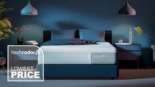 A Casper Wave Hybrid Snow mattress on a bed with bedside tables either side