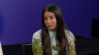 Asha Sharma in white shirt with leaf pattern