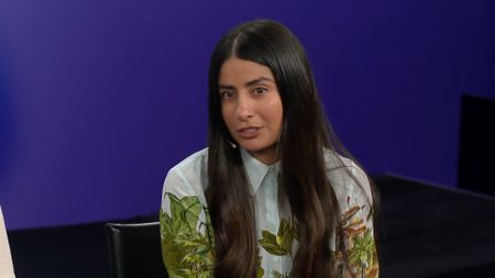 Asha Sharma in white shirt with leaf pattern